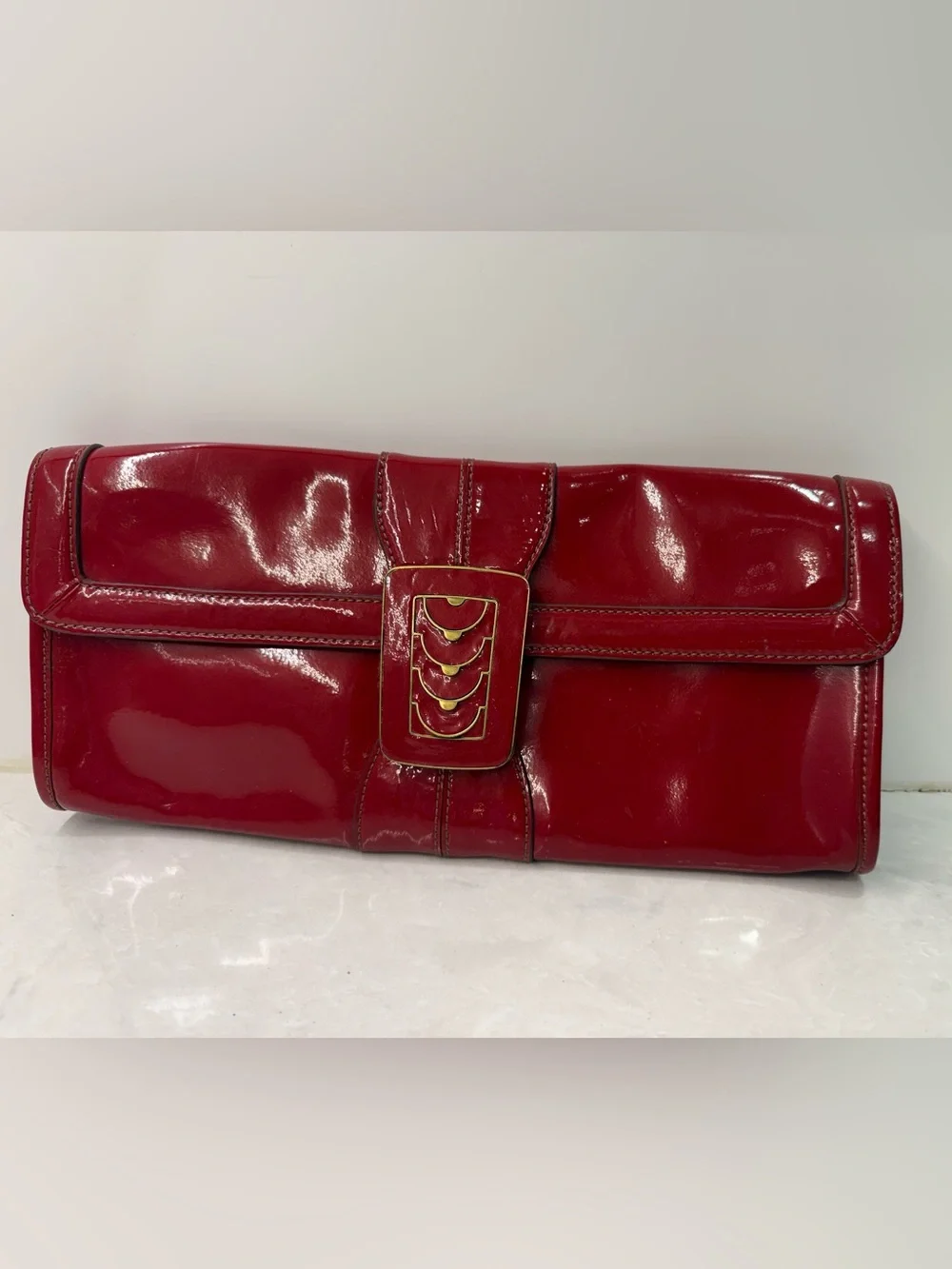 Cole Haan Red Patent Leather Clutch with Gold Accent Buckle